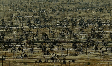 An oil field with a large number of pumping jacks operating in the Central Valley of California is seen on June 24, 2015. MARK RALSTON/AFP/Getty Images.